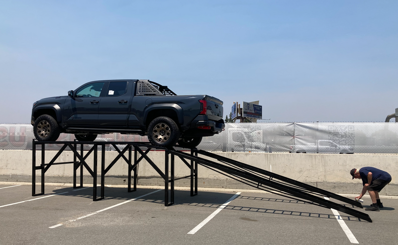 Load image into Gallery viewer, Screenshot of a 60-inch level car display ramp by My Store, showing the ramp's design and measurement features.