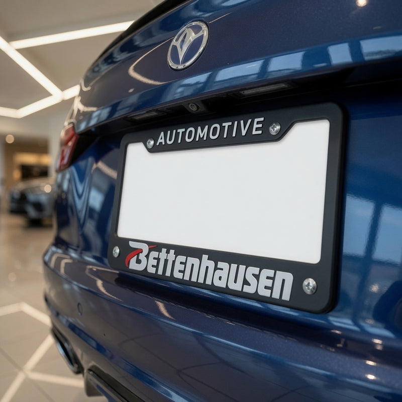 Load image into Gallery viewer, Black custom license plate frame with raised imprint, designed by My Store, mounted on a car for a sleek personalized look.