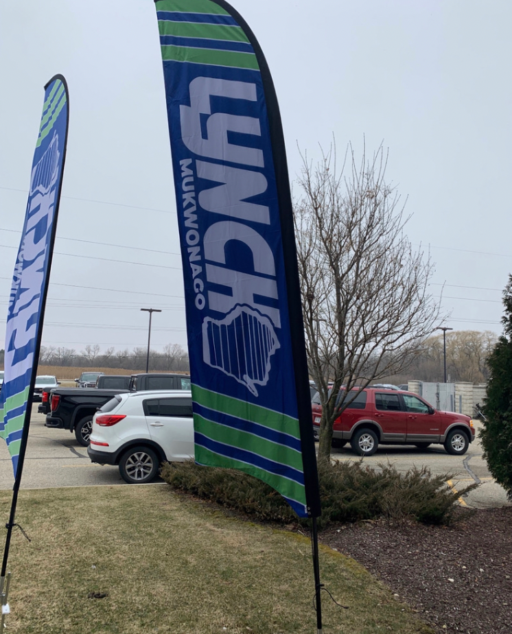 Load image into Gallery viewer, 15-foot custom feather flag with vibrant colors and branding, ideal for outdoor advertising and promotional displays