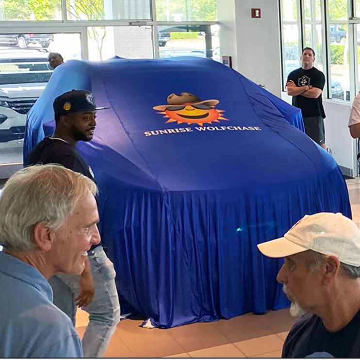 Load image into Gallery viewer, Custom Reveal Cover for SUV and truck by My Store, showcasing a sleek, durable vehicle cover on a large SUV or truck.