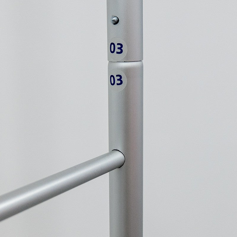 Load image into Gallery viewer, Magnetic straight fabric banner stand displaying a sleek, curved display with a fabric graphic for promotional use.