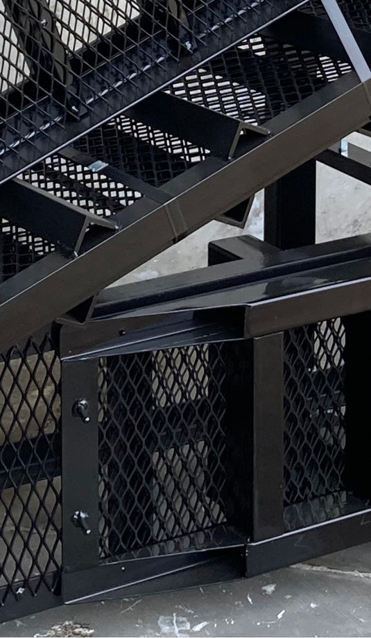 Steel 30-inch vehicle display ramp with sturdy construction, ideal for showcasing cars or other vehicles in a retail setting.