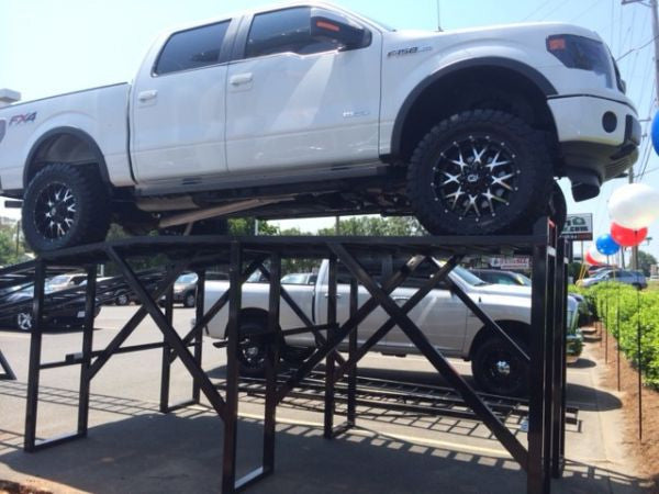Load image into Gallery viewer, 60-inch car display ramp for leveling and showcasing vehicles, made of durable material, ideal for automotive displays.

