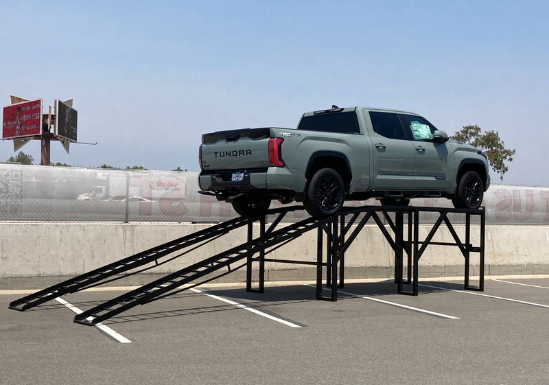Load image into Gallery viewer, Screenshot of a 60-inch level car display ramp used for vehicle maintenance and inspection.
