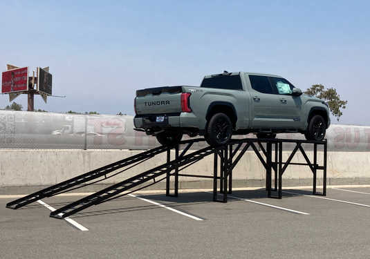 Screenshot of a 60-inch level car display ramp used for vehicle maintenance and inspection.