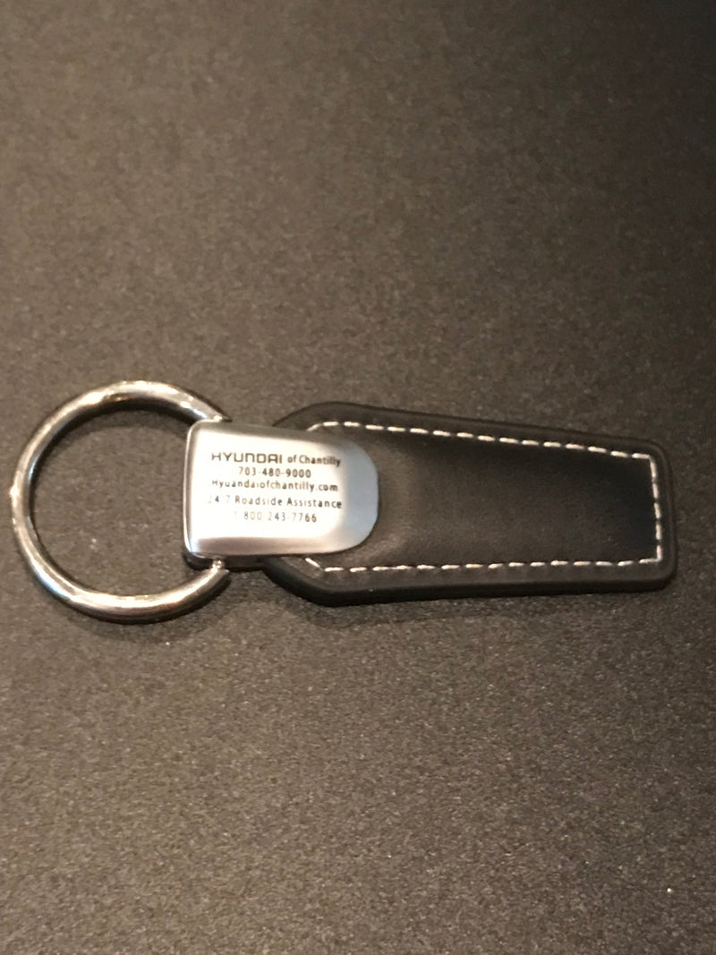 Load image into Gallery viewer, Twist &amp; Release Brushed Chrome Metal/Leather Key Fob
