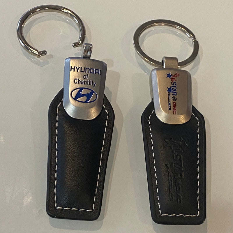 Load image into Gallery viewer, Twist &amp; Release Brushed Chrome Metal/Leather Key Fob
