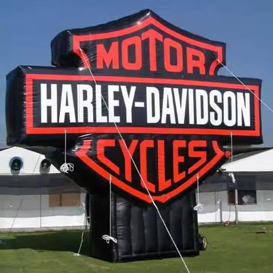 Inflatable Harley-Davidson motorcycle billboard with red and black color scheme, featuring the Harley-Davidson logo.