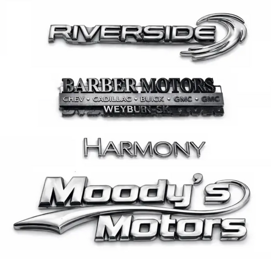 Flexible plastic rear deck badge with 3M tape for easy attachment, designed for vehicle customization and branding.