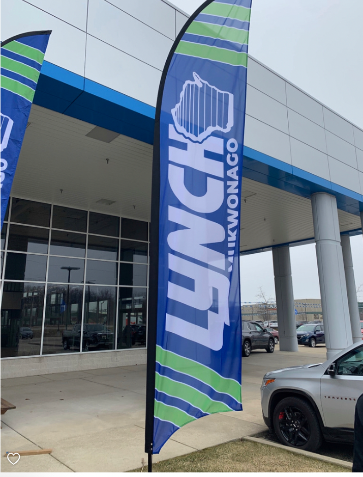 Load image into Gallery viewer, 15-foot custom feather flag with vibrant colors and lightweight fabric, ideal for outdoor advertising and promotional displays.

