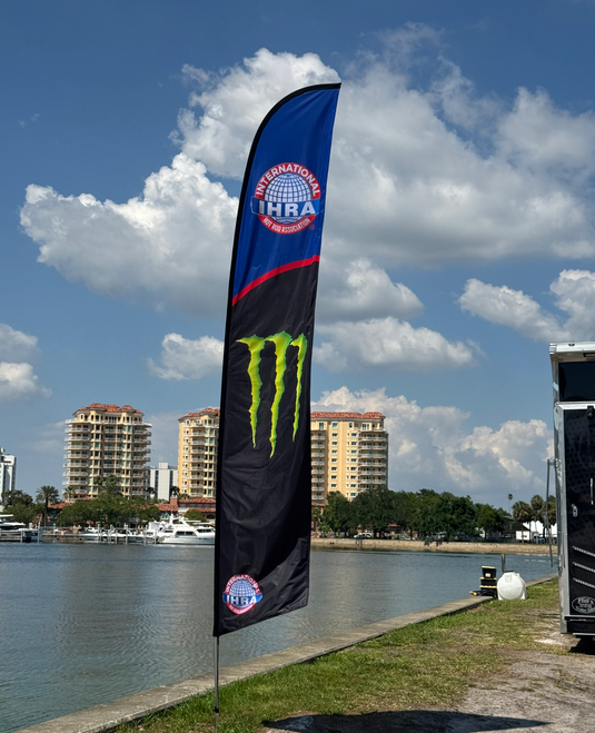 Custom 15 ft feather flag from My Store with vibrant colors and a tapered shape, ideal for outdoor advertising and promotions.