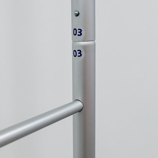 Magnetic straight fabric banner stand displaying a sleek, curved display with a fabric graphic for promotional use.