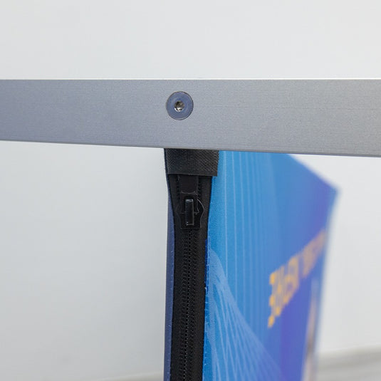 Magnetic straight fabric banner stand with a sleek frame and vibrant fabric display, ideal for trade shows and events.